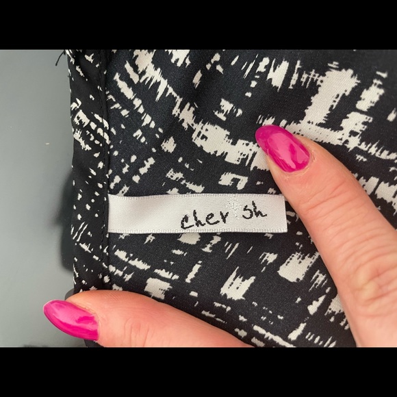 Cherish peplum blouse with cold shoulder and open back. - Picture 3 of 3